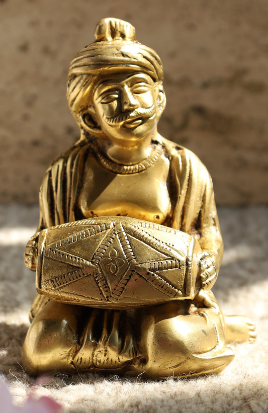 Musician playing Dholak