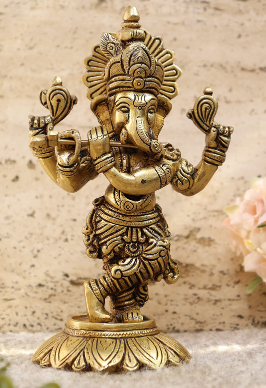 Ganesh Idol Playing Flute On Pedestal
